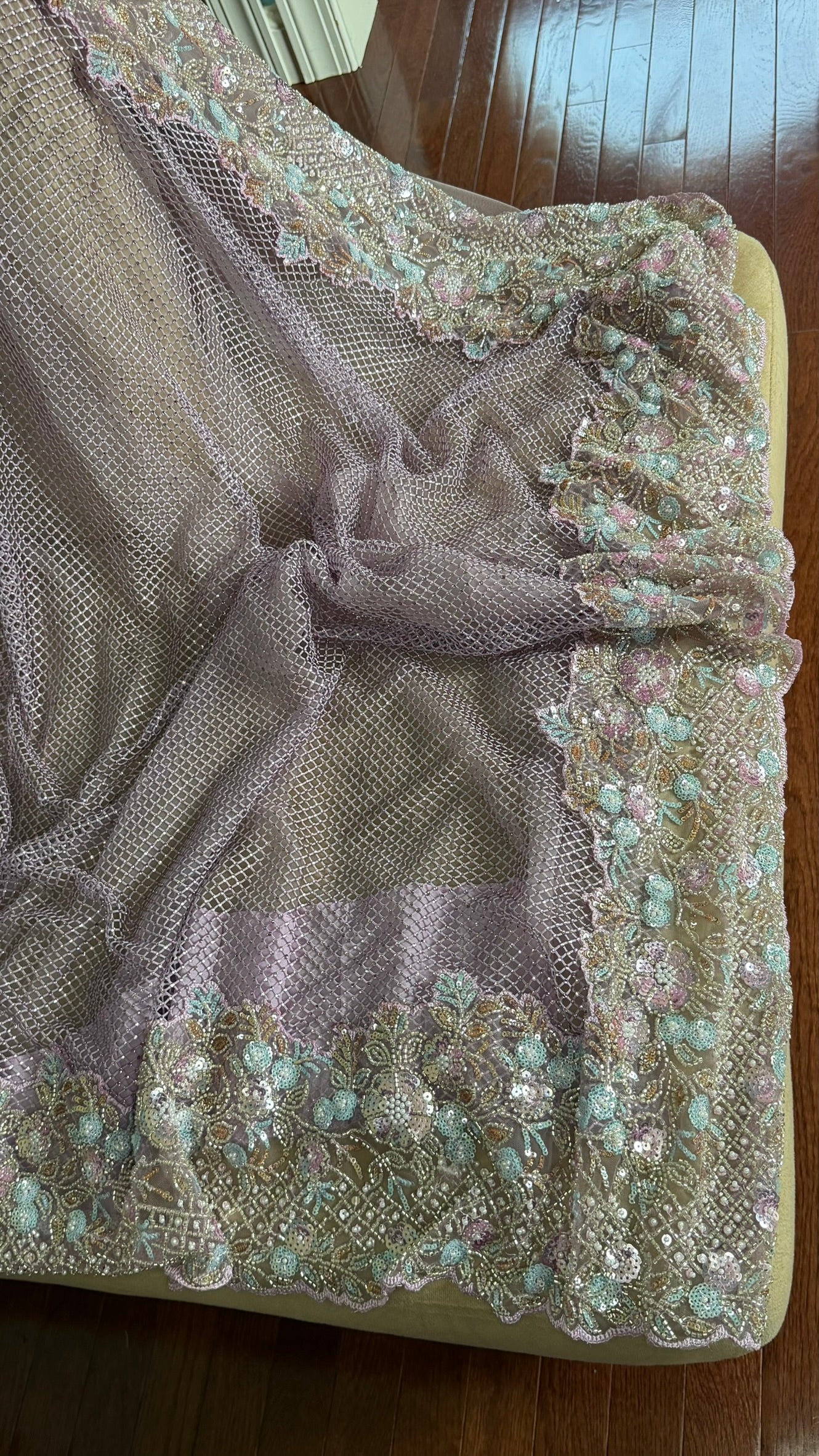 Net saree with heavy embroidered blouse and border