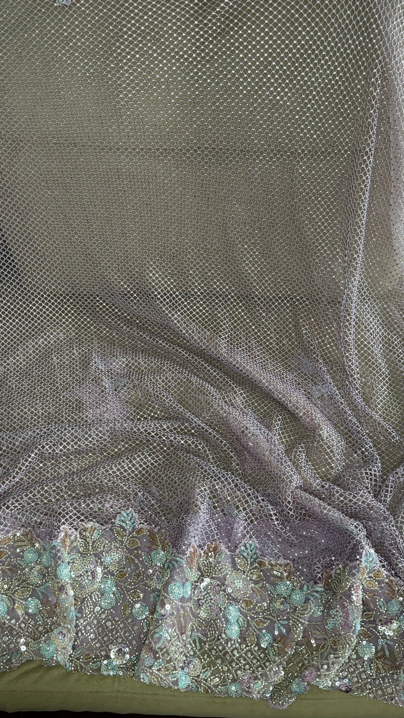 Net saree with heavy embroidered blouse and border