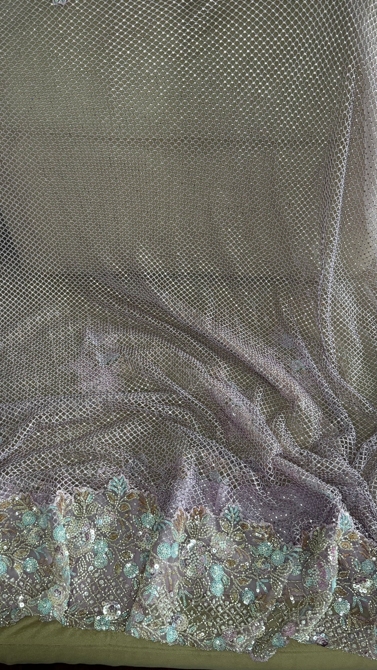 Net saree with heavy embroidered blouse and border