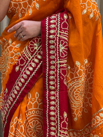Bandhini on silk with kacha gota work