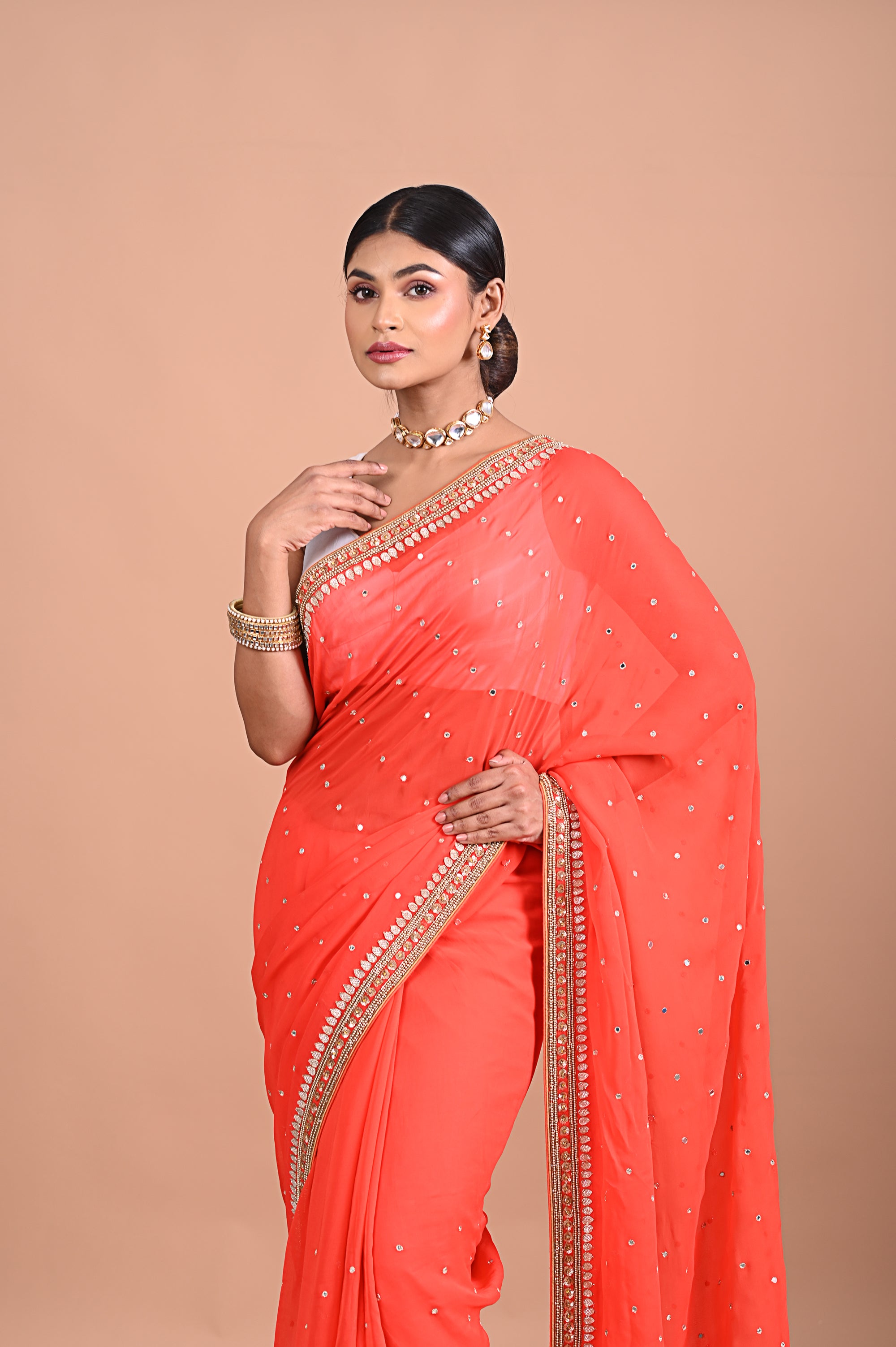 Georgette saree with Gold work border