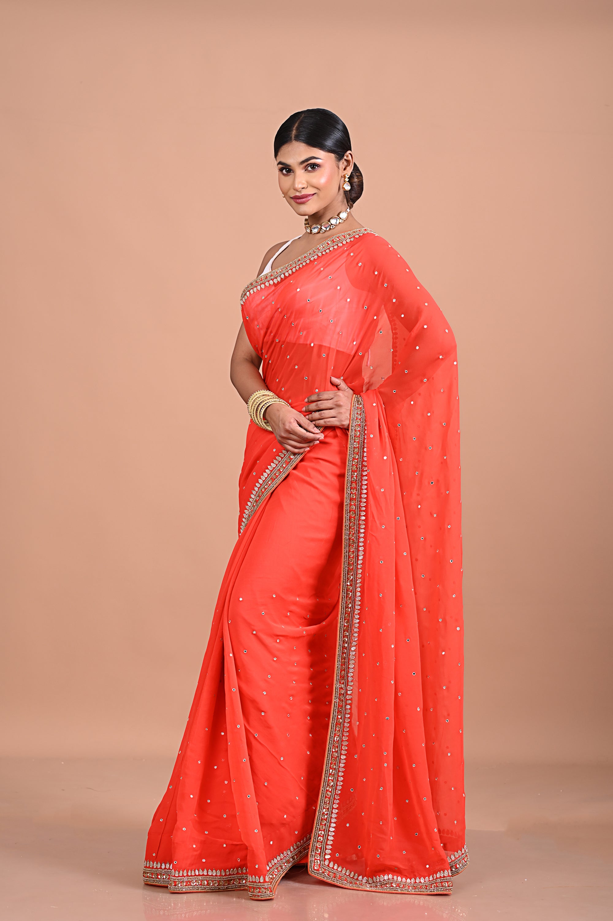 Georgette saree with Gold work border