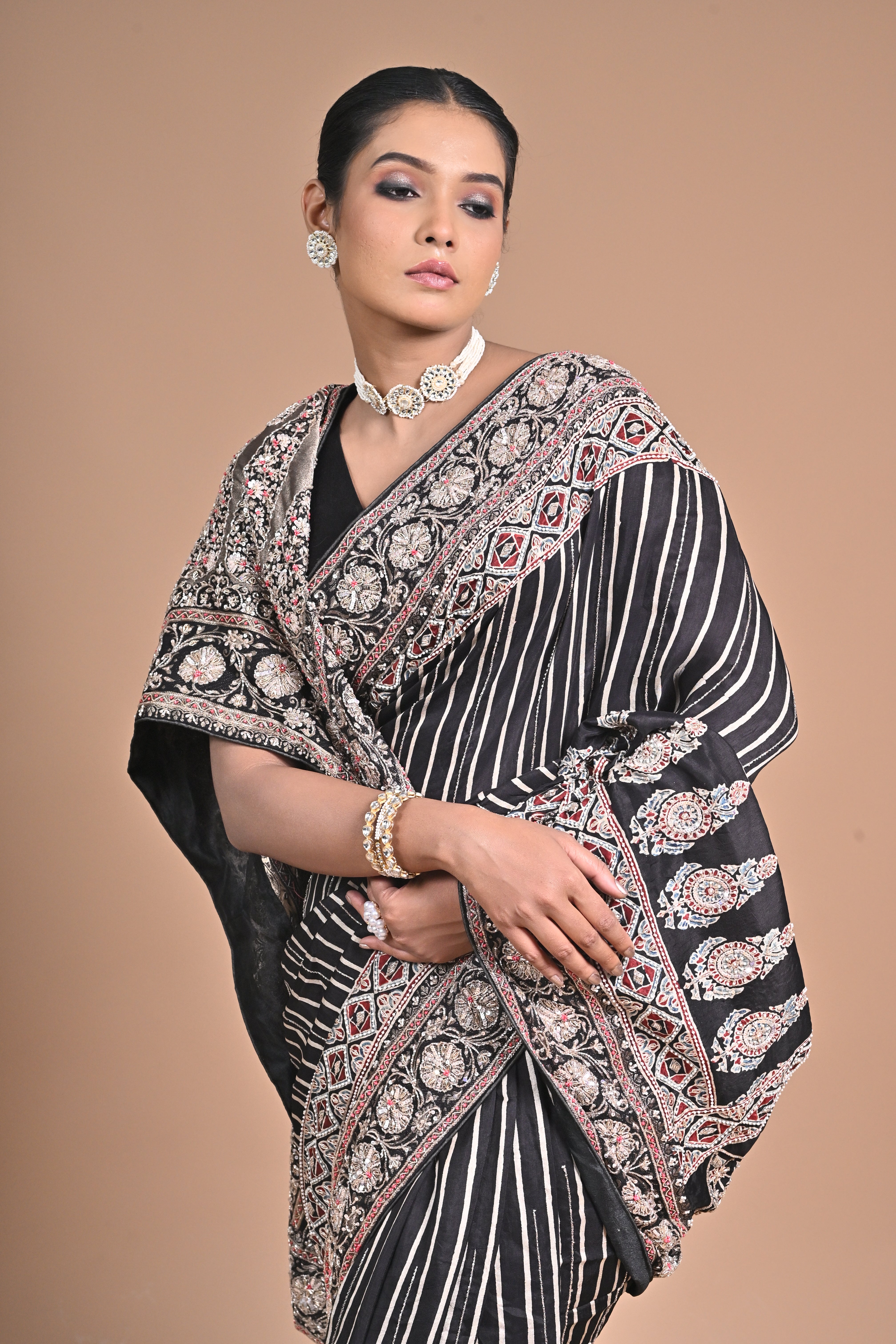 Ajrakh Elegance on Gajji Silk – Hand Embroidered Masterpiece