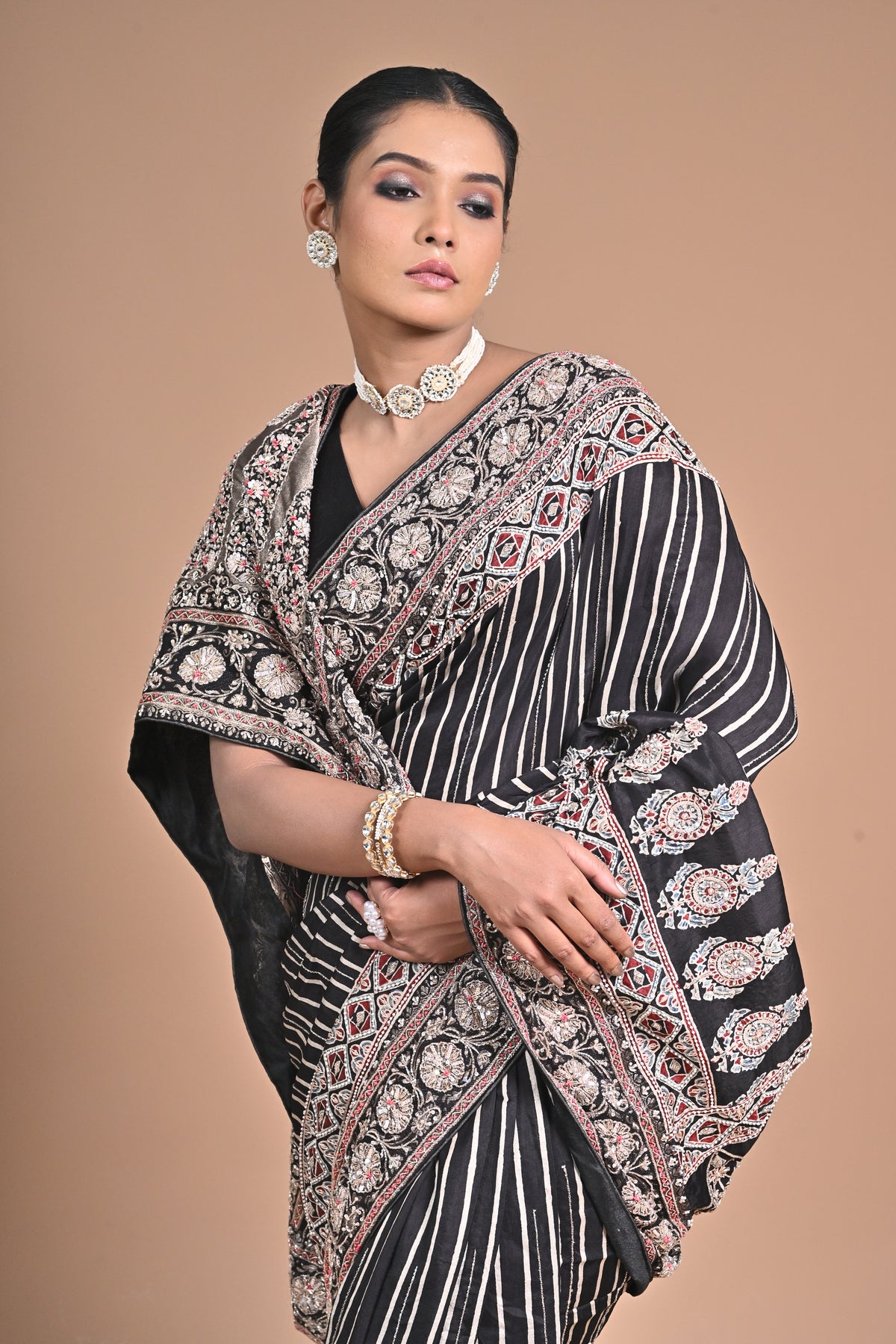 Ajrakh Elegance on Gajji Silk – Hand Embroidered Masterpiece