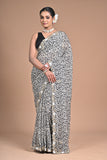 Ethereal Charm – Printed Georgette Saree with Hand Embroidered Border & Blouse
