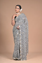 Ethereal Charm – Printed Georgette Saree with Hand Embroidered Border & Blouse