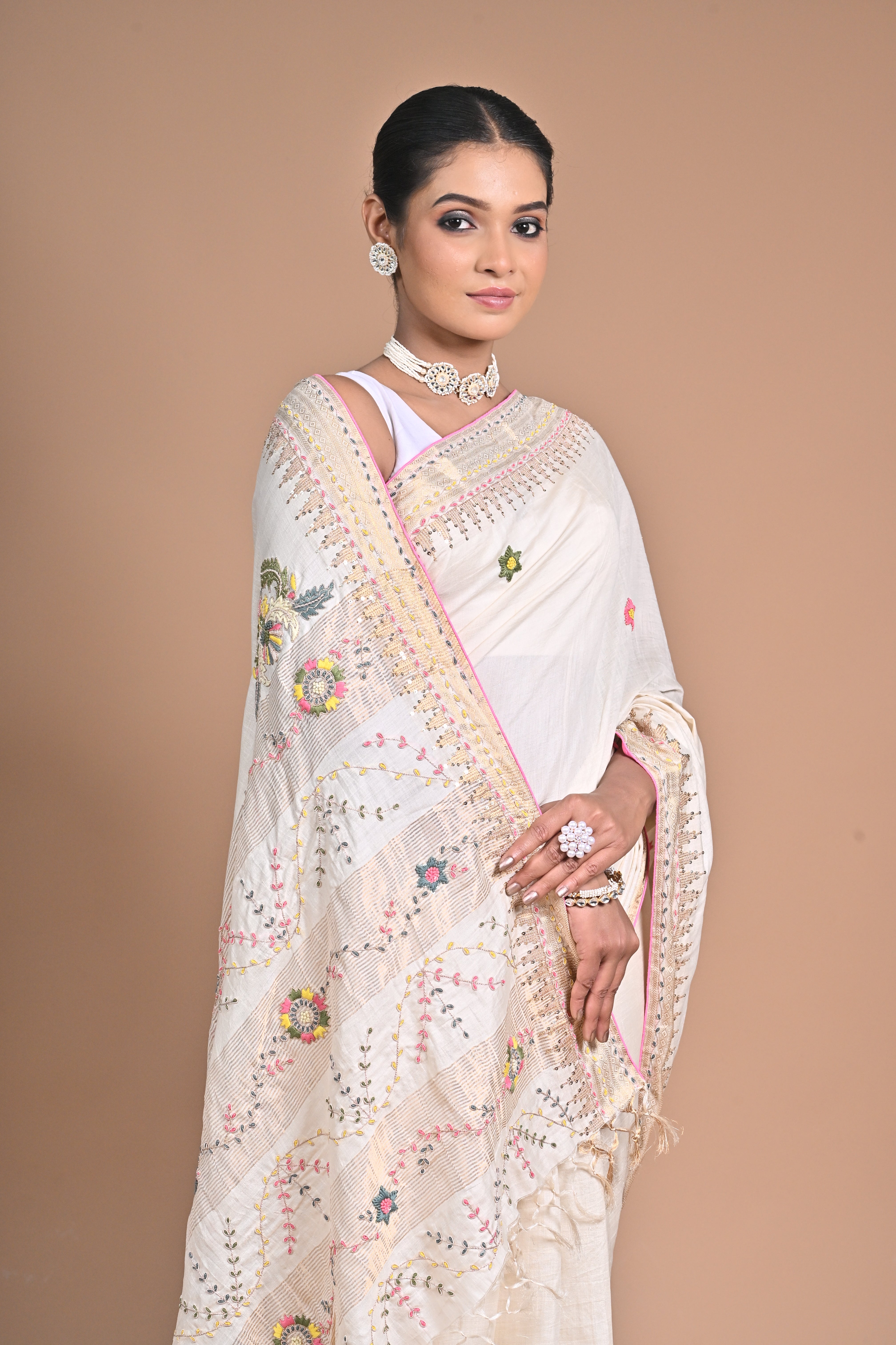 “Heritage Bloom” – Handwoven Off-White Saree with Floral Embroidery