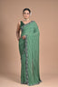 “Emerald Grace” – Minimalist Green Saree with Floral Lace Border