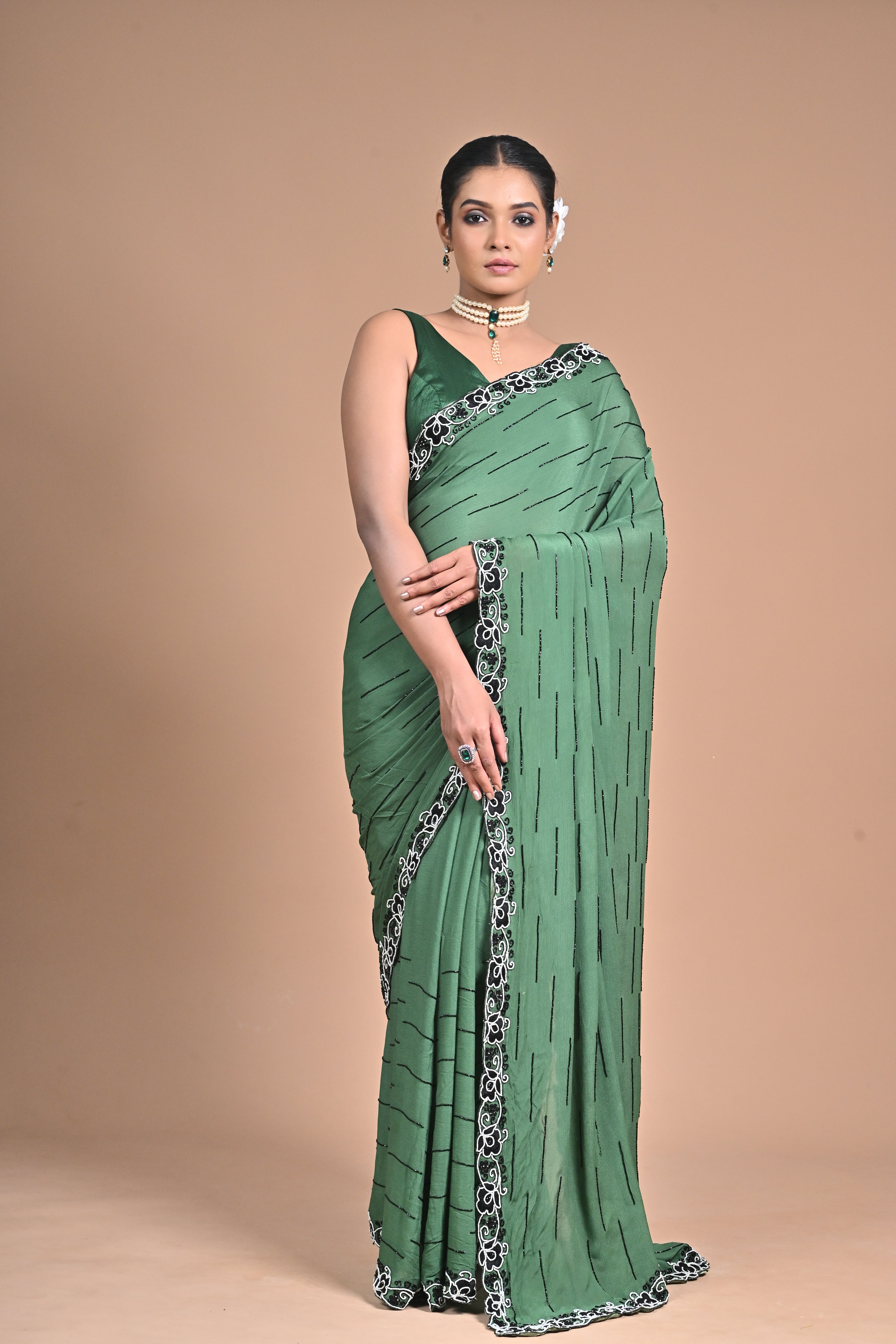 “Emerald Grace” – Minimalist Green Saree with Floral Lace Border