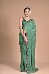 “Emerald Grace” – Minimalist Green Saree with Floral Lace Border