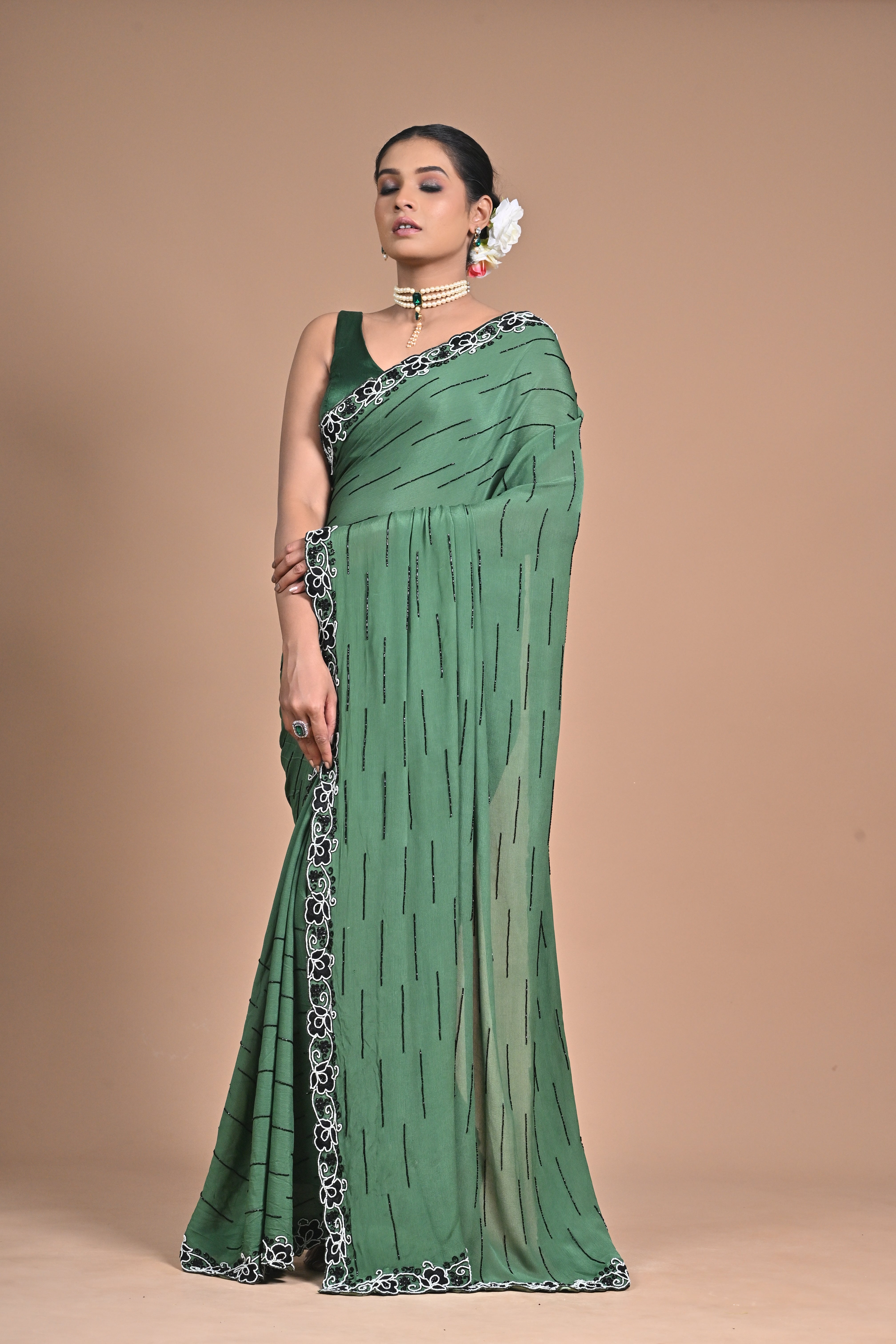 “Emerald Grace” – Minimalist Green Saree with Floral Lace Border