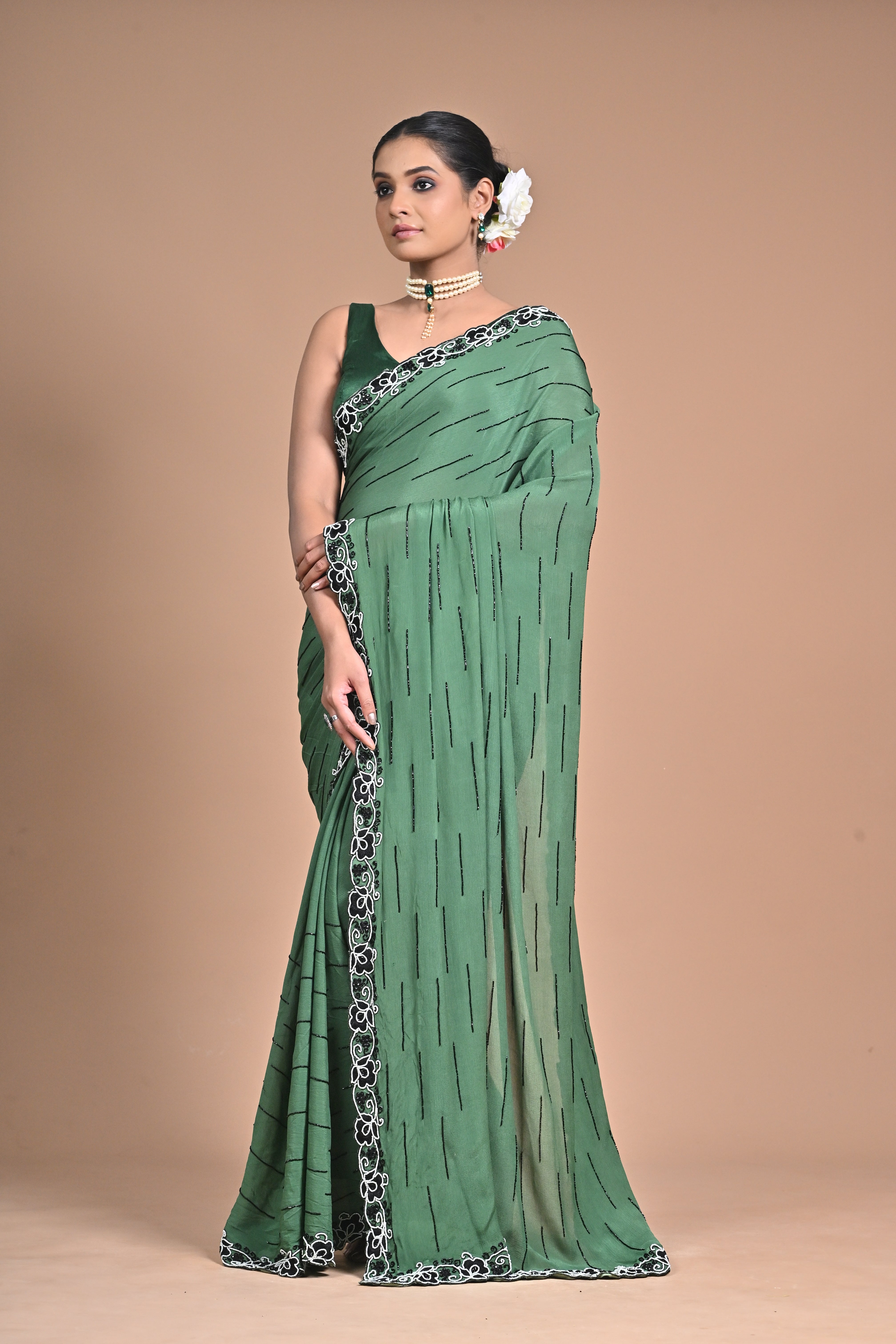 “Emerald Grace” – Minimalist Green Saree with Floral Lace Border