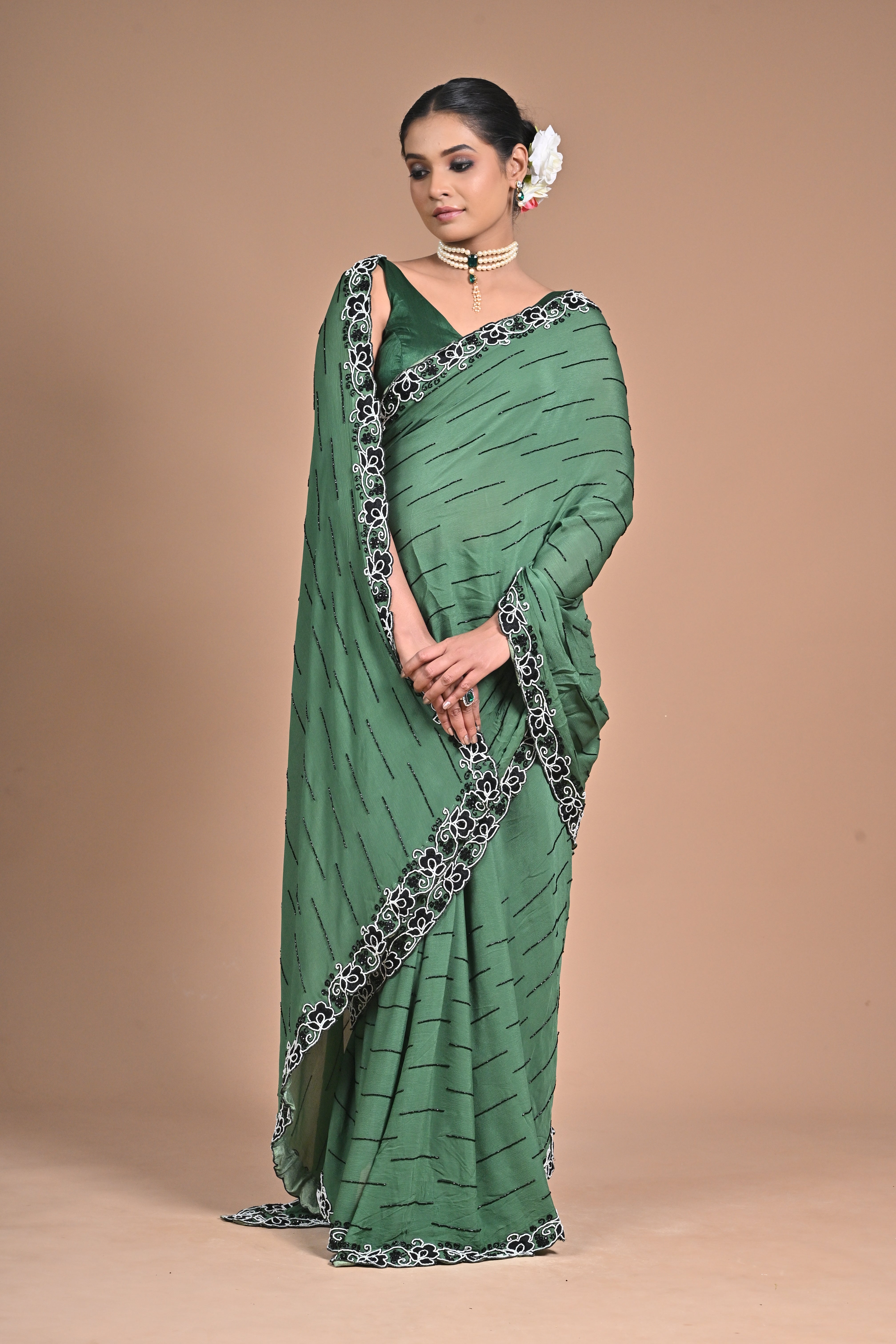 “Emerald Grace” – Minimalist Green Saree with Floral Lace Border