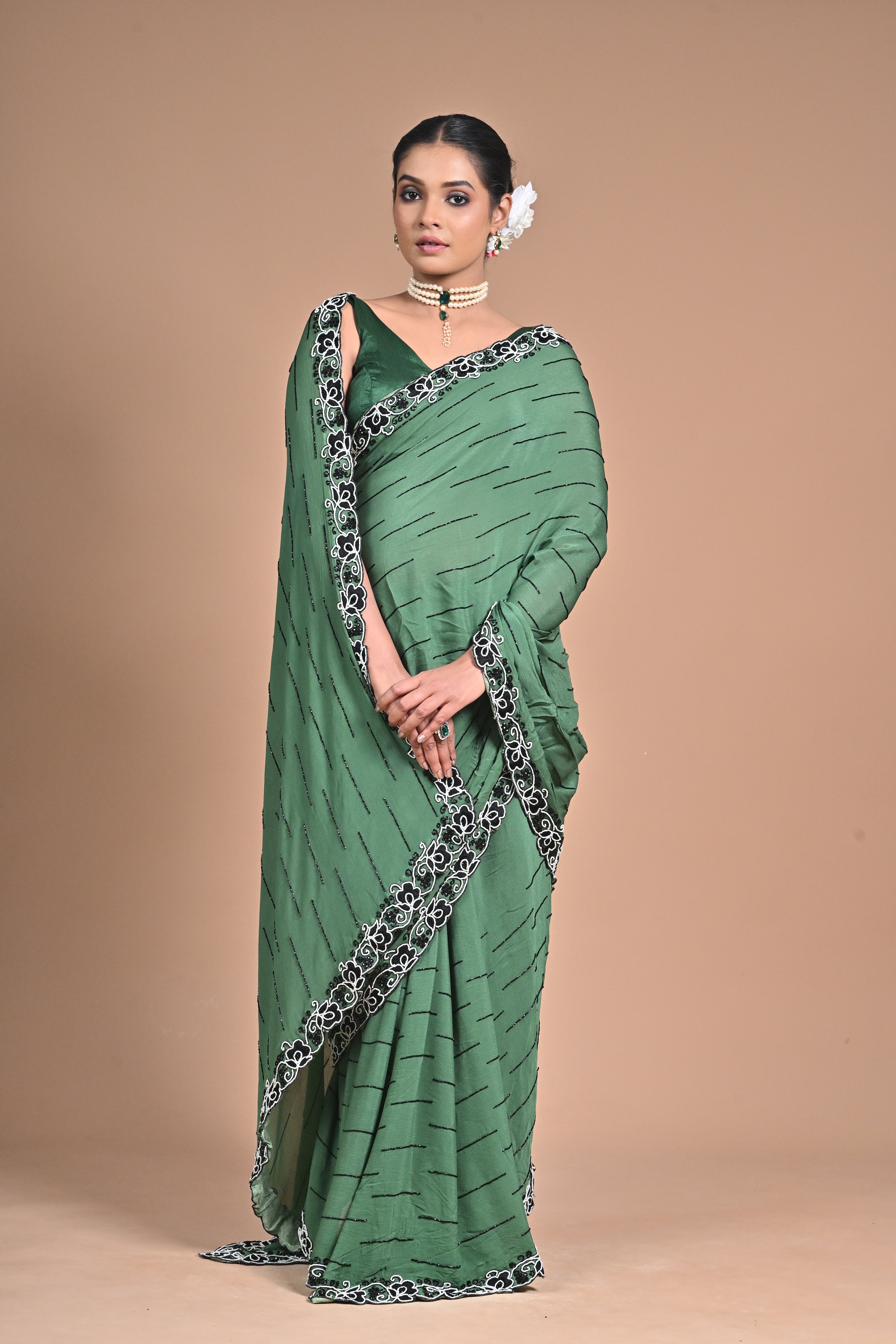 “Emerald Grace” – Minimalist Green Saree with Floral Lace Border
