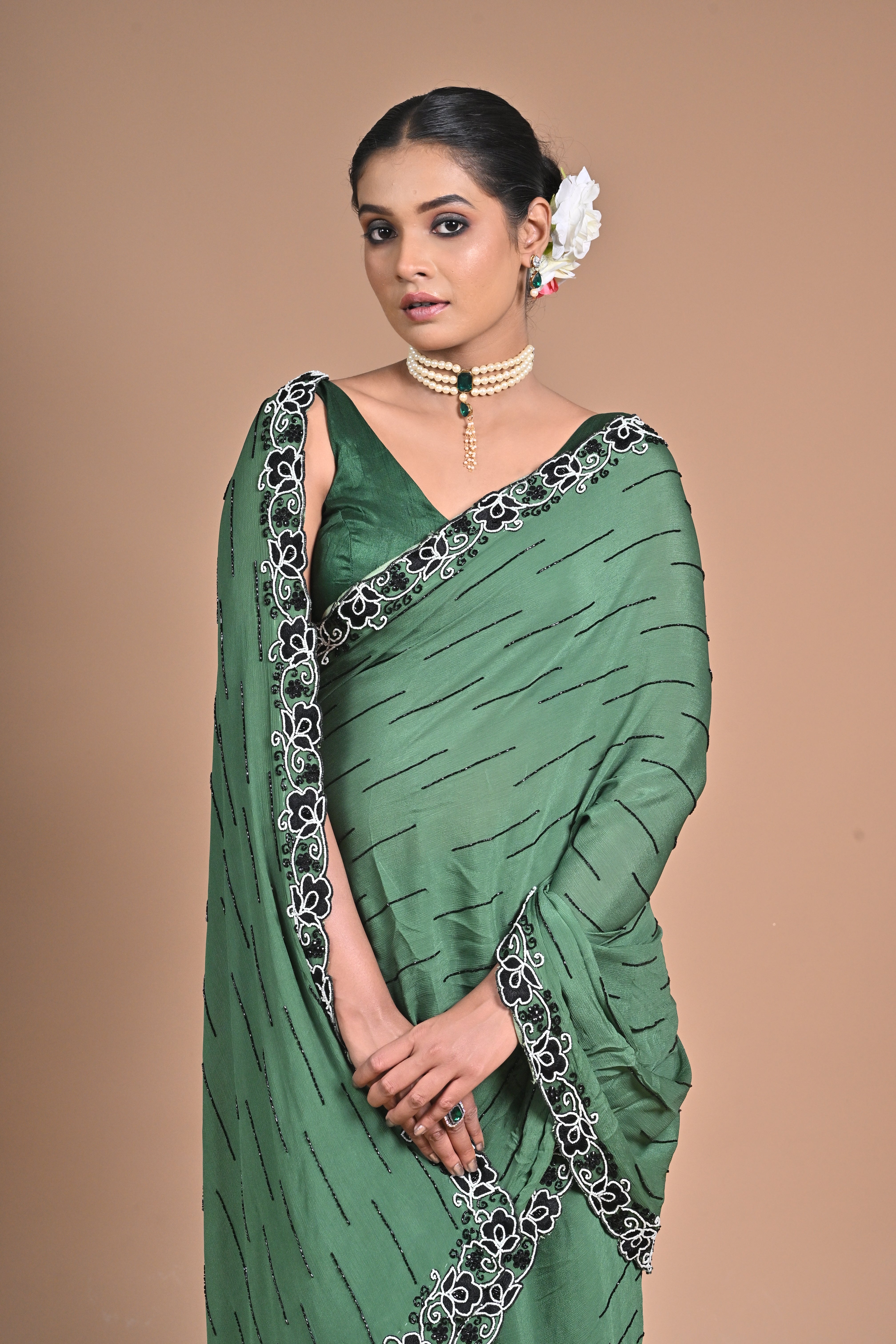 “Emerald Grace” – Minimalist Green Saree with Floral Lace Border