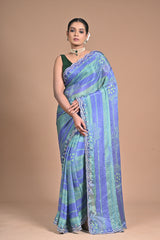 “Azure Mist” – Blue & Green Georgette Saree with Lace Border