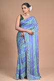 “Azure Mist” – Blue & Green Georgette Saree with Lace Border