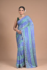 “Azure Mist” – Blue & Green Georgette Saree with Lace Border