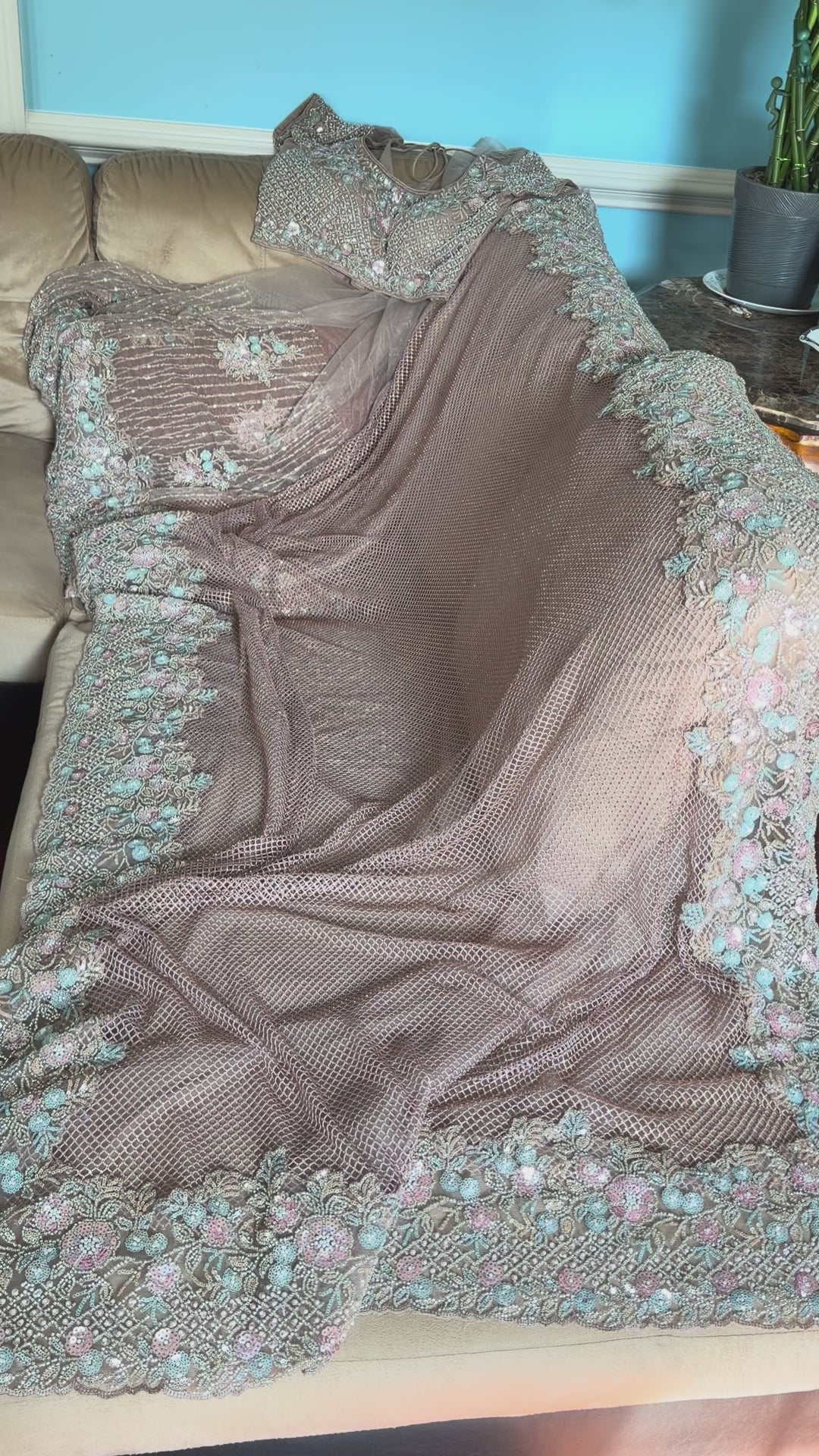 Net saree with heavy embroidered blouse and border
